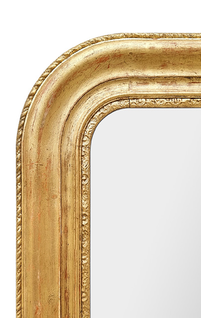 detail miroir cheminee bois dore