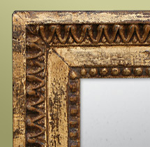 Détail miroir ancien bois dore