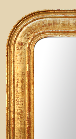 Glace miroir ancien, bois doré à décors gravés patinés