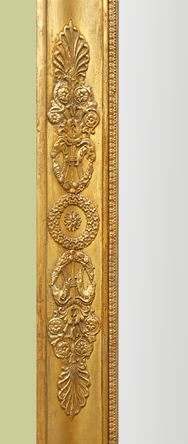 Encadrement miroir bois doré époque empire decor palmettes, tête de bélier