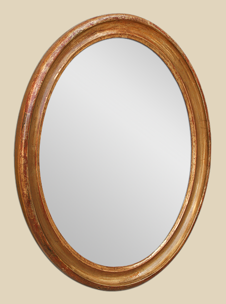 Miroir ovale ancien en bois doré à la feuille