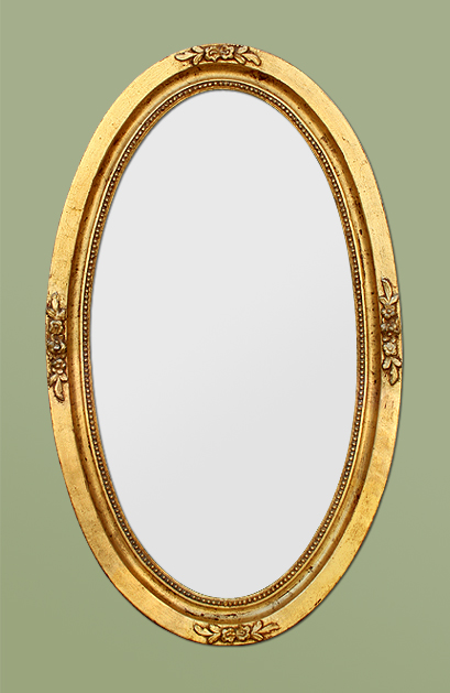 Grand miroir ovale ancien bois doré patiné