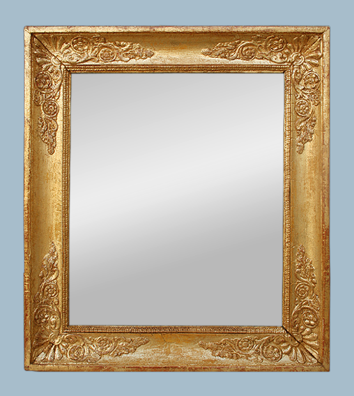 Miroir ancien d'époque restauration bois doré à déocr de palmettes