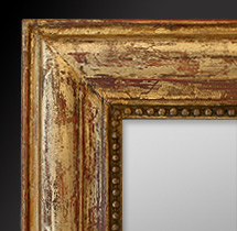 détail miroir ancien bois doré