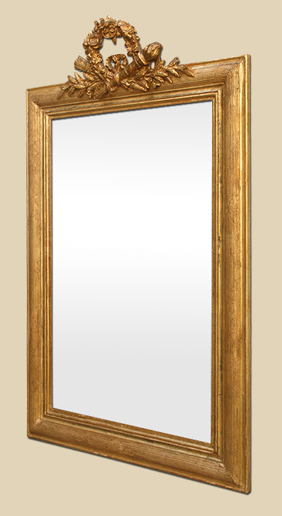Miroir doré à coquille style Louis XVI 