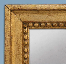 Miroir ancien à décors de perles époque louis XVI