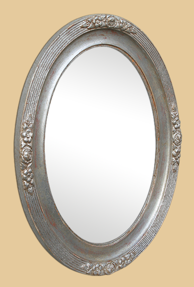 Miroir ovale argenté ancien décor floral