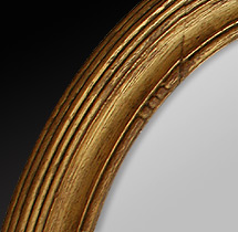 Miroir ancien bois dor&eacute; ovale