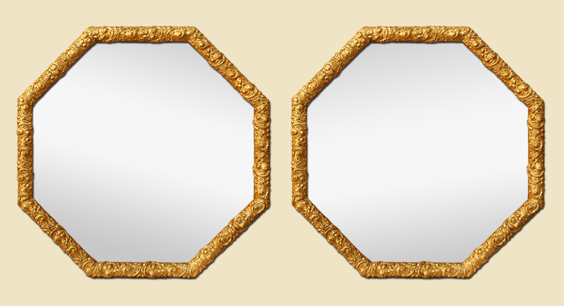 Paire de miroirs octogonaux anciens bois dorés