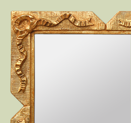 Petit cadre miroir doré décors noeuds anciens