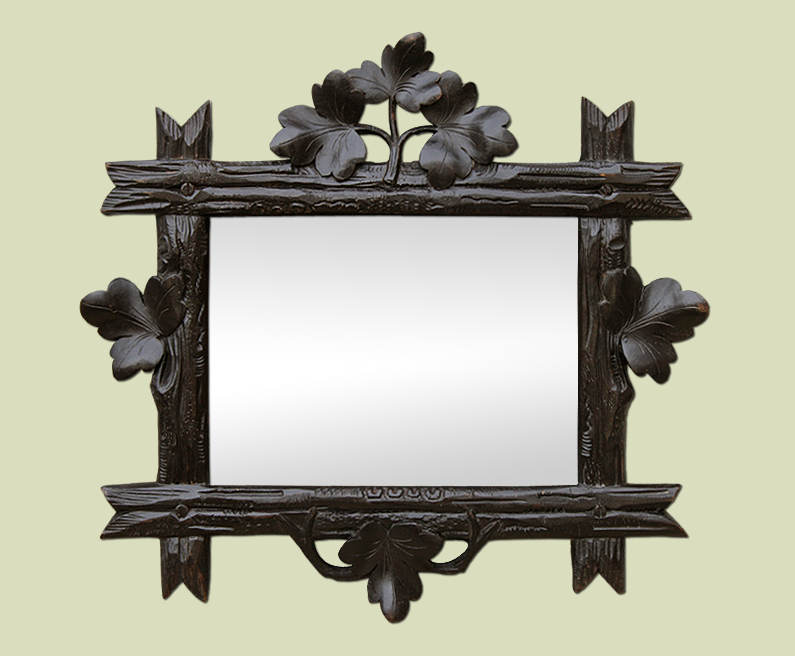 Petit miroir bois sculpté décor de branchages et feuilles style Art Populaire