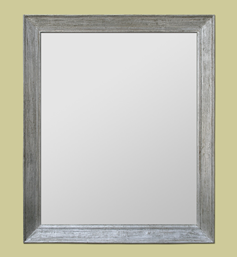 Miroir en bois mouluré argenté à la feuille