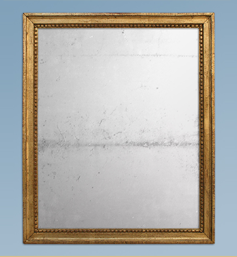 Miroir doré époque Louis XVI glace au mercure