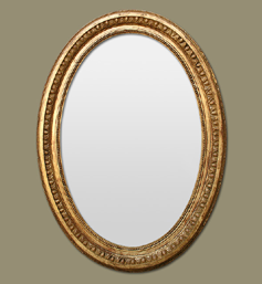 Miroir ovale bois doré style napoléon III