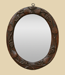 petit-miroir-ancien-en-bois-forme-ovale-decor-vignes-sculpte-vi