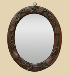 petit-miroir-ancien-en-bois-forme-ovale-decor-vignes-sculpte
